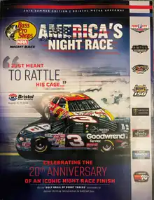 The 2019 Bass Pro Shops NRA Night Race program cover, featuring the finish of the 1999 Goody's Headache Powder 500 between Dale Earnhardt and Terry Labonte.