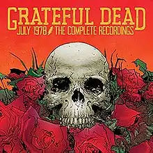 A skull on a bed of roses, against an orange background