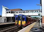 A train at Dorking station in 2012