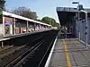 The tracks and platforms of Eltham station with the former Eltham Park station building visible in 2008