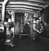 A conductor and brakeman in a freight train caboose in 1943