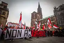 Protesters holding a banner saying "No to merger" (Non a la fusion) during a demonstration in November 2014 in Strasbourg, against the merger of Grand Est.