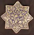 Three Tiles with 'Lajvardina' Glaze, second half 13th–14th century, Iran. Stonepaste; molded, overglaze painted, and gilded. Metropolitan Museum of Art