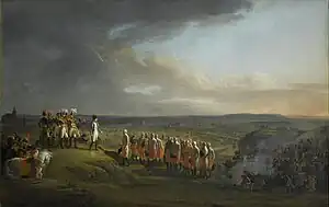 Colored painting depicting Napoleon receiving the surrender of the Austrian generals, with the opposing armies and the city of Ulm in the background