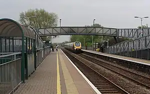 A CrossCountry train passes west through Worle in 2012.