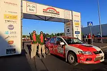 Aleksey Lukyanuk and Aleksey Arnautov at Rally Tallinn finish