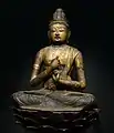 A gilt-wood statue of Vairocana Buddha, 11th-12th century.