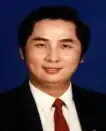 head shot of Chiu Chuang-liang wearing buissness attire