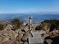 The summit of Mt. Kaimon with Lake Ikeda in the background