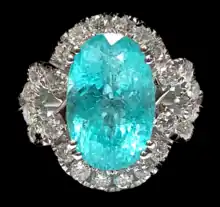 A paraiba tourmaline and diamond ring, in platinum