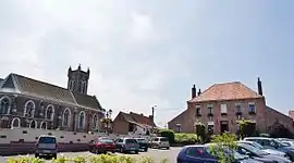 The town hall and church of Racquinghem