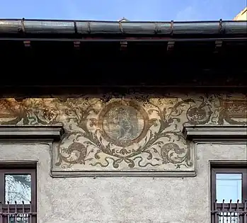 Fresco with cartouches and foliage spirals on the upper part of the facade of Strada Occidentului no. 11, Bucharest, painter: C. Cora, architect: Cesare Fantoli, 1910