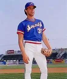 A baseball player in blue and white