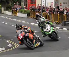 2013 Isle of Man TT Saturday afternoon practice — Bruce Anstey (5), James Hillier (1) & Gary Johnson (7); Parliament Square, Ramsey 1 June 2013.