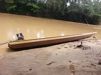 small boat & water levels rise after heavy rain overnight at Lidung Jelo