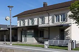 Two-story building with hip roof