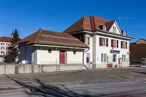 Two-story building with hip roof