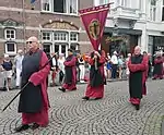 Confraternity of the Holy Cross with banner