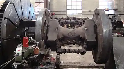 A steam locomotive driving wheel on the lathe