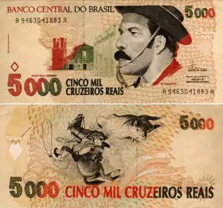 A CR$5,000 banknote portraying a gaúcho and chimarrão-shaped watermarks