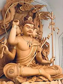 Statue of Shiva depicted as a Chinese Buddhist deva on Mount Putuo Guanyin Dharma Realm in Zhejiang, China