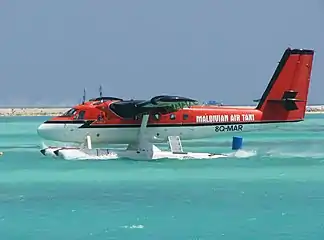 A Maldivian Air Taxi. An air taxi is a small commercial aircraft that makes short flights on demand.