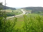 Autobahn A 71 and new line in the valley of the Wipfra, in the background is the northern entrance of the Sandberg Tunnel