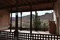 View of a terrace inside the village mosque, built several centuries ago, overlooking the nearby orchards and mountains