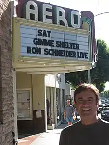 Schneider at a screening of Gimme Shelter in 2007