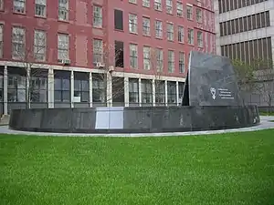 A photo of the memorial at the burial ground