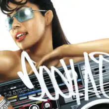 A mid-shot of Ai against a white background, where she smiles, wearing long hair and blue tinted glasses. She is not noticeably wearing clothes, however the lower half of her body is covered by a boombox. "2004 A.I." is hand-written in front of the image in white, in a graffiti-style font.