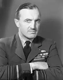 Portrait of moustachioed man in Royal Air Force winter uniform