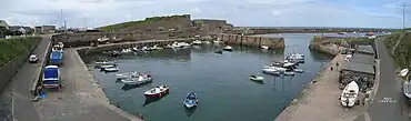 The inner harbour, breakwater designed by James Walker in the background