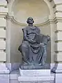 Statue Geschichtsschreiber der Vergangenheit (Chronicler of the past) at the Federal Palace in Berne, Switzerland.