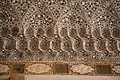 Muqarnas cornice inside the Sheesh Mahal (Hall of Mirrors) in the Amber Fort in Amer (17th century)