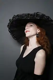 Amy Alkon in oversized black mushroom-brim design by milliner Amy Downs, 2009