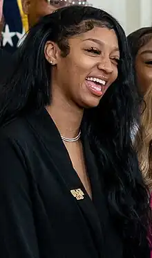 Reese smiling during a team visit to the White House