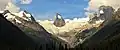 Anniversary Peak (left), Hound's Tooth/Marmolata Spire (centered) in Bugaboo Glacier, and Snowpatch Spire (right). East aspect.