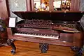 Antique piano at Stanley Hotel (note the "C...e...g" in "Chickering" aligns with the CEG chord on the piano)