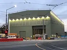 Acoustic shed on St Kilda Road to mask excavation noise during construction of Anzac station, 2020.