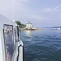 Approaching Bustins Island's public dock. The building in view is known as the nubble