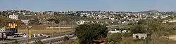 Panoramic view from the west, photographed from a hill to the south of highway 65.