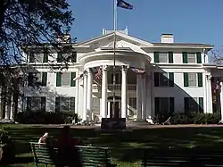 Three-story house with semicircular portico