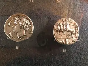 Silver decadrachm from Syracuse, Sicily. Head of Arethusa left, four dolphins around