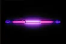 Vial containing a violet glowing gas