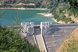 Sculpture perched on the front of the dam of Arriaran (Gipuzkoa)