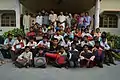 Pathak at a book and stationery distribution event for poor students