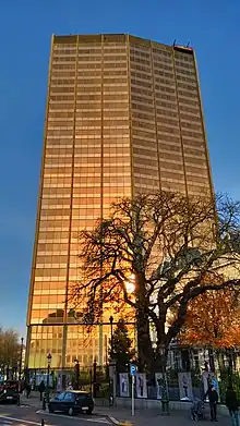 The Astro Tower before renovation with its original copper-coloured cladding