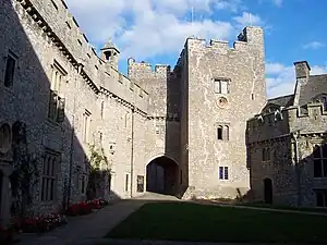 tower to right, battlemented wall to left