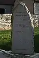 Memorial to floods on the Doubs.